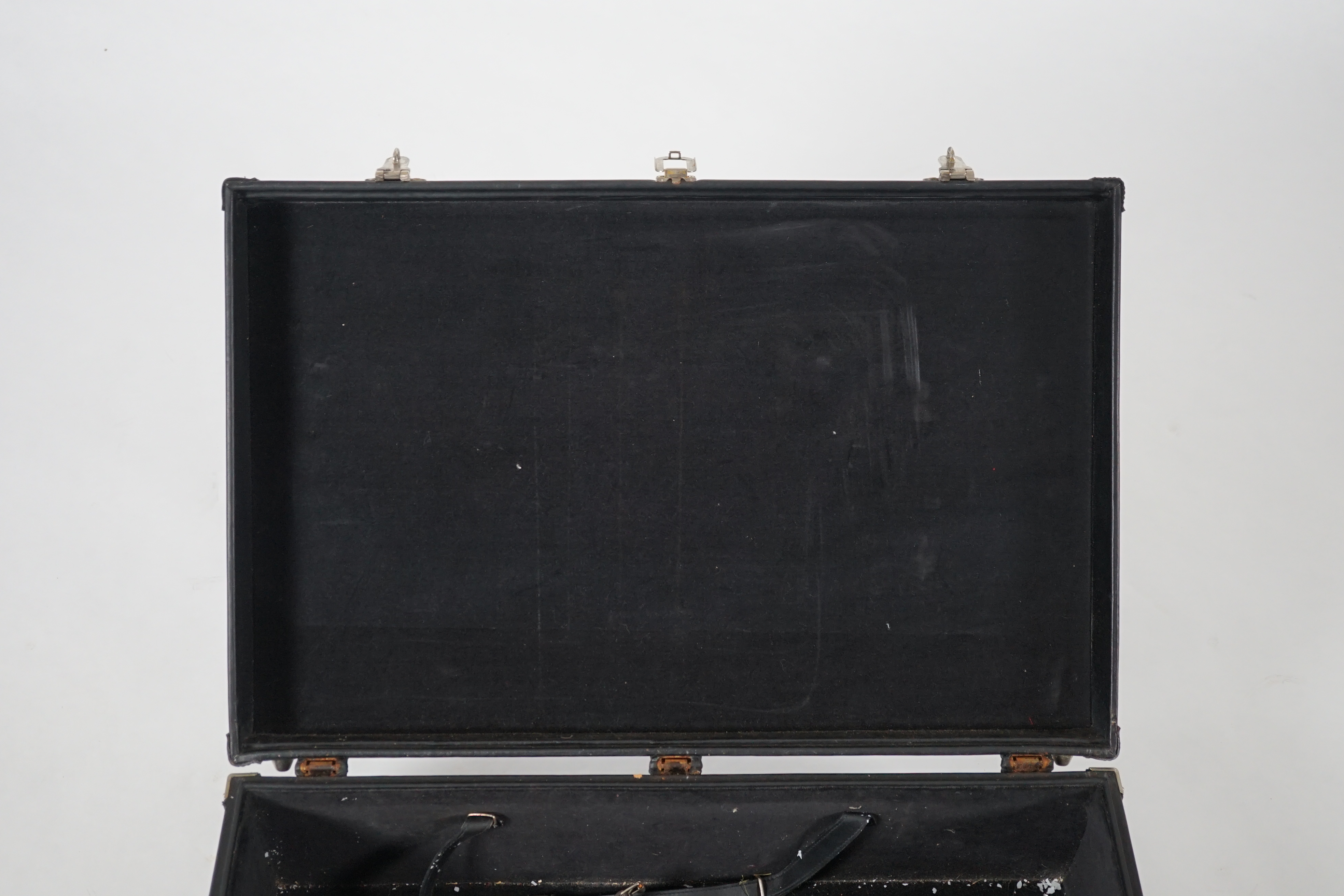 A Nina Cerruti black leather suitcase Length 64.5cm, depth 22cm, width 42cm